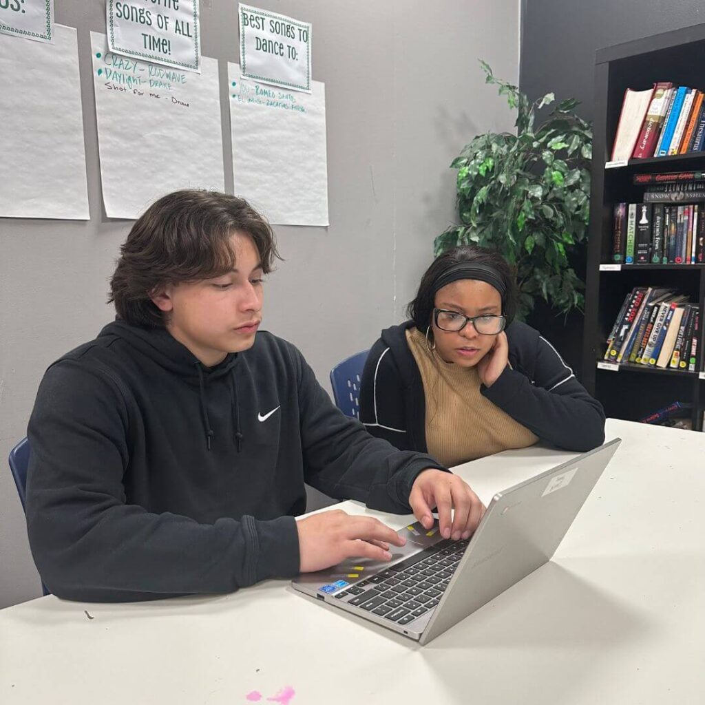 Tim B. and BGCB Consultant, Amber Reese, reviewing Tim’s pre-college application